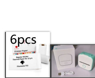 Portable mini thermal label printer accessories including printer paper and USB cable.