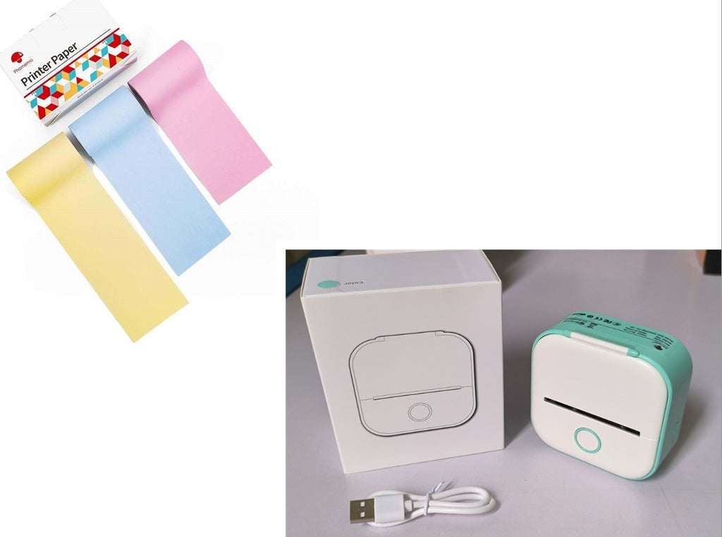 Portable mini thermal label printer with colorful printer paper and USB charger.