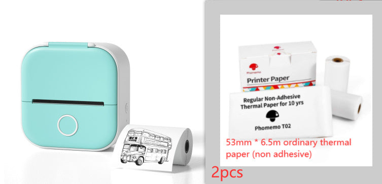 Portable mini thermal label printer next to printer paper packaging and printed label.